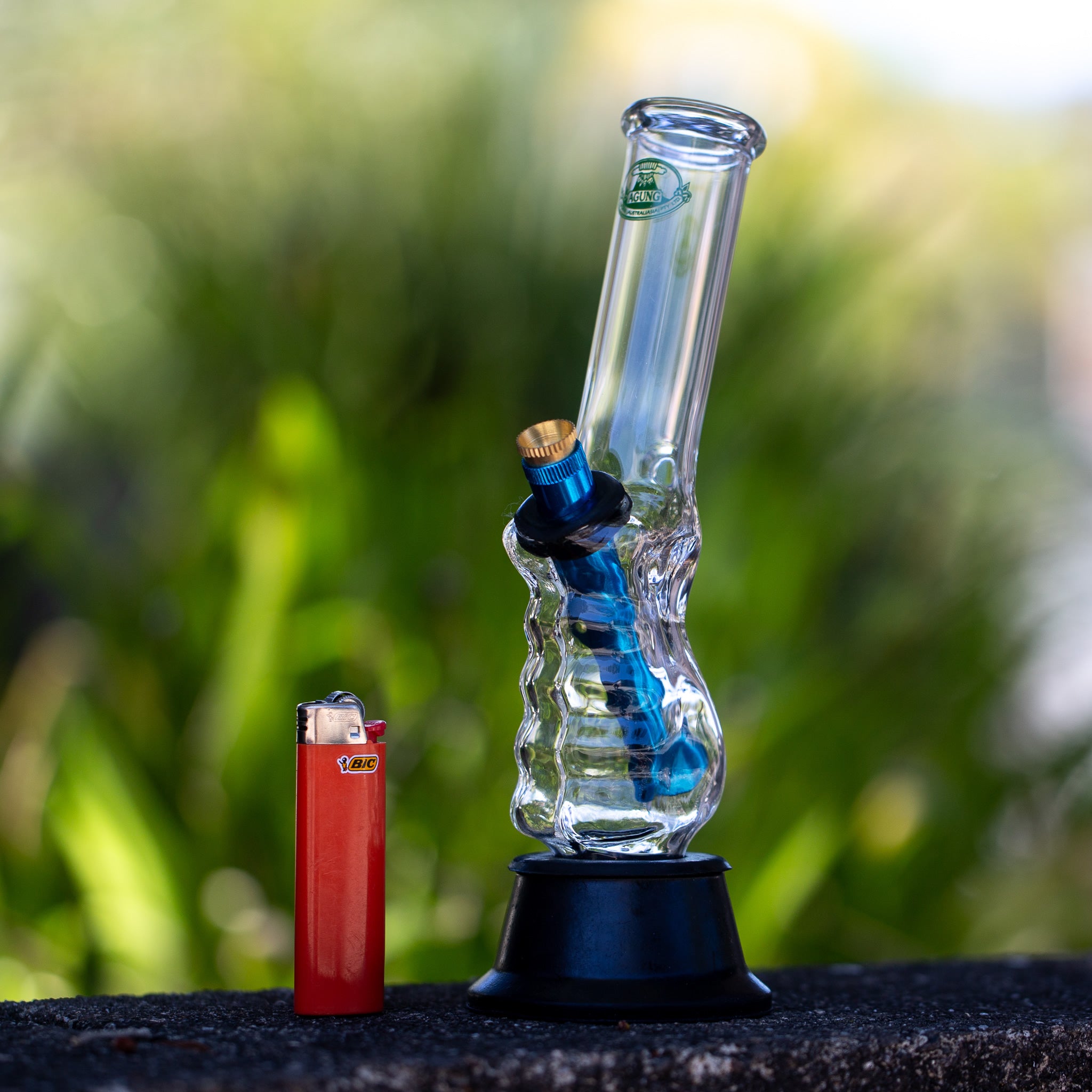 Outdoor photo of smaller 23cm Agung gripper bong.