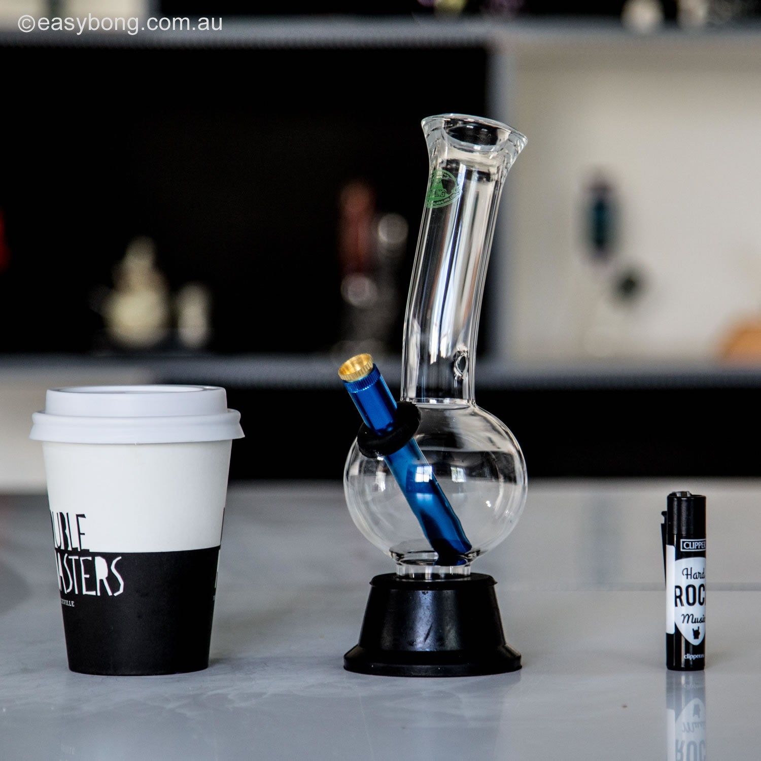 Aussie style glass bong with brass cone piece.