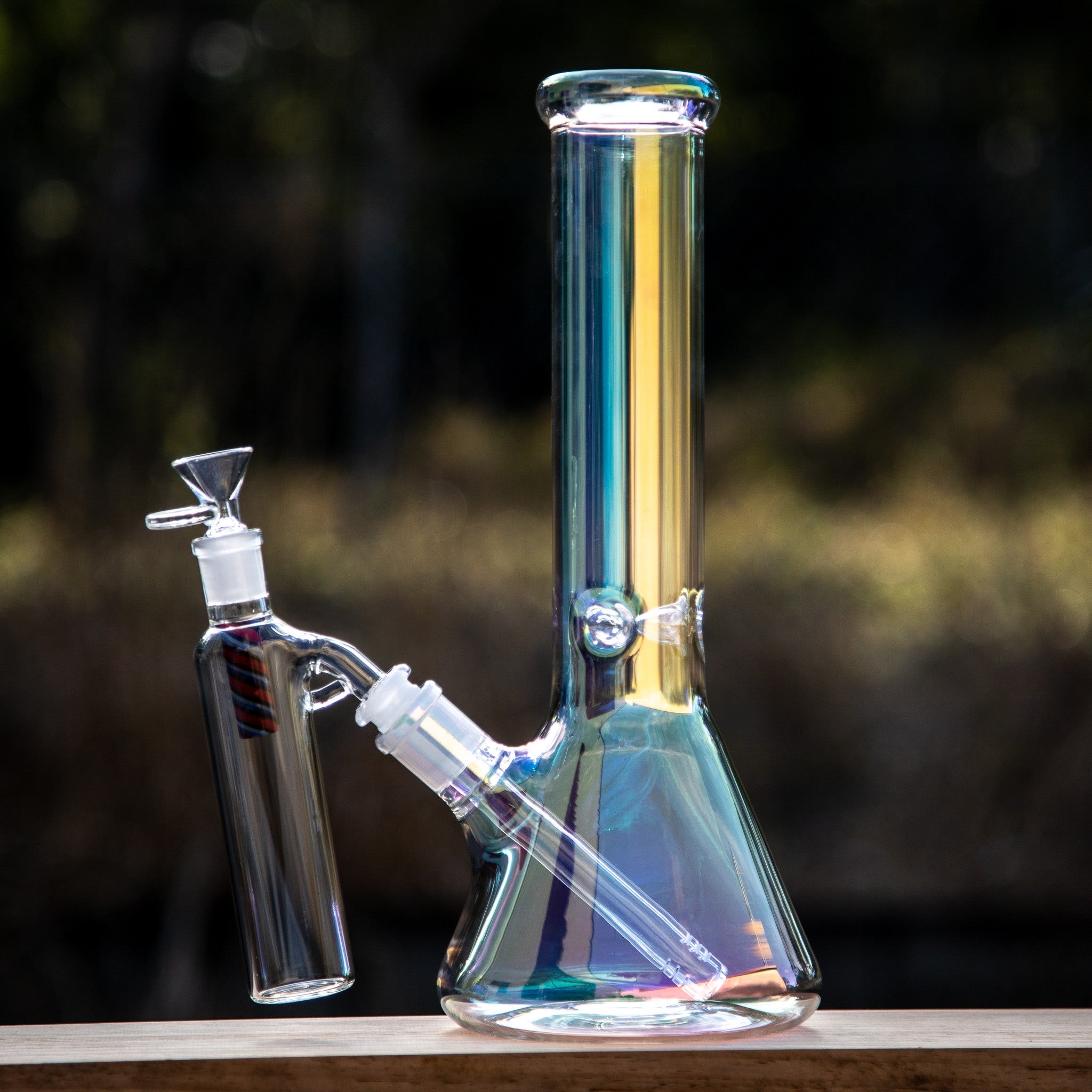 Glass beaker bong with ash catcher.