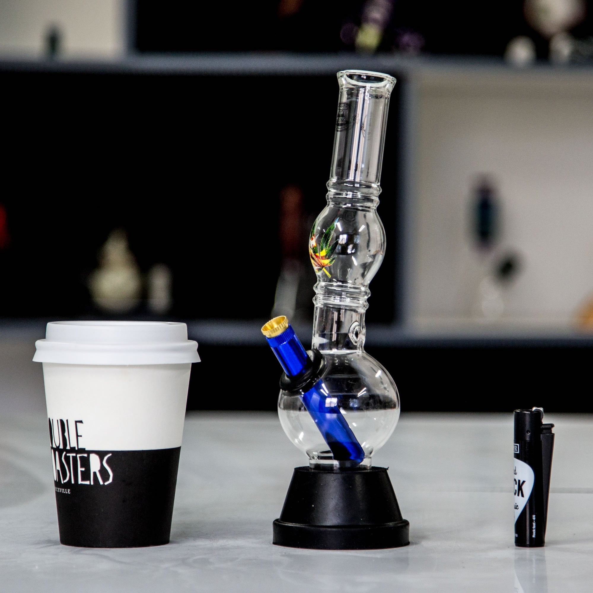 Cheap bong designed for Aussie stoners with metal stem and brass cone piece.