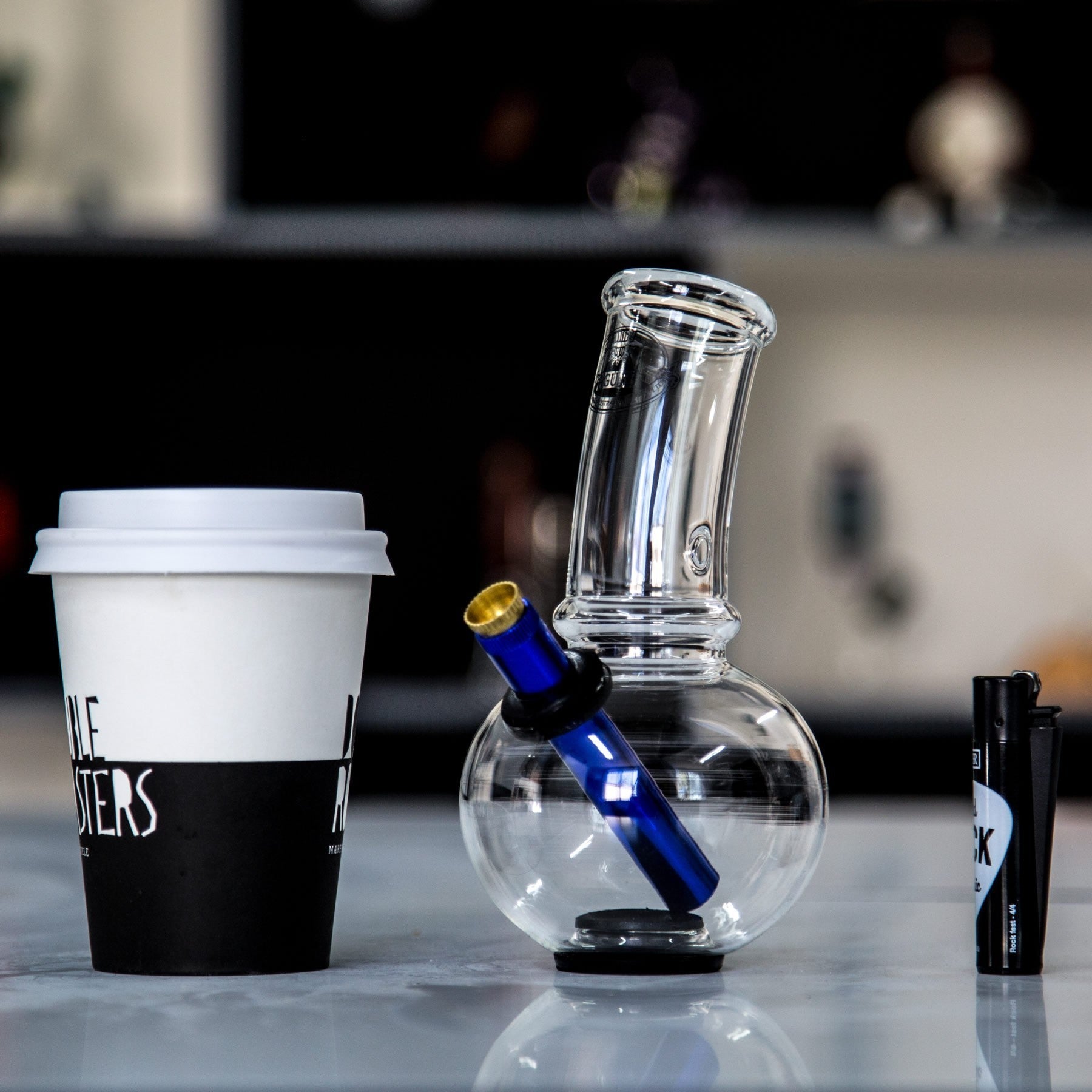 Little Agung glass bong sitting on table at Easy Bong shop.