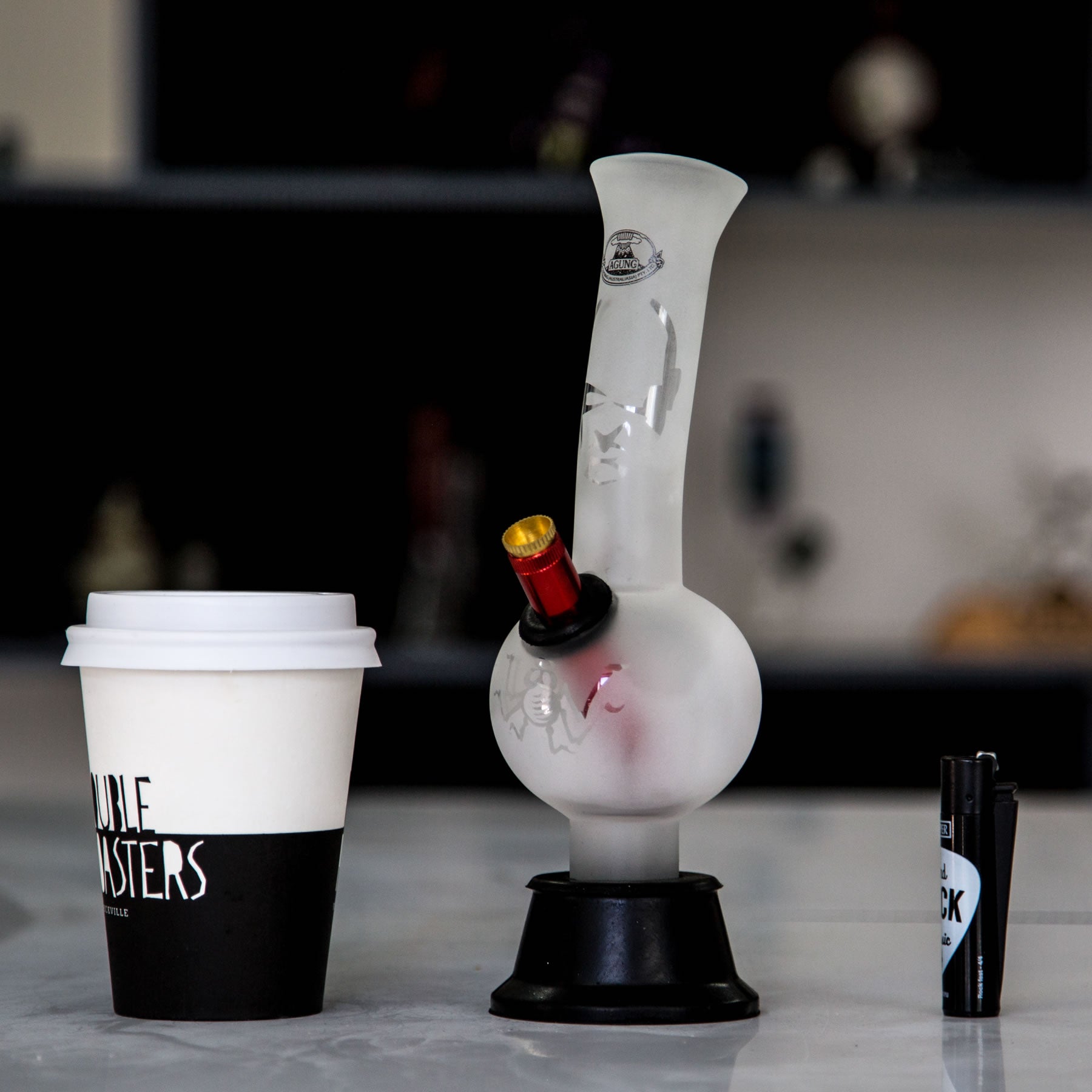 Frosted glass bubble bong from Agung Australia with coffee cup.