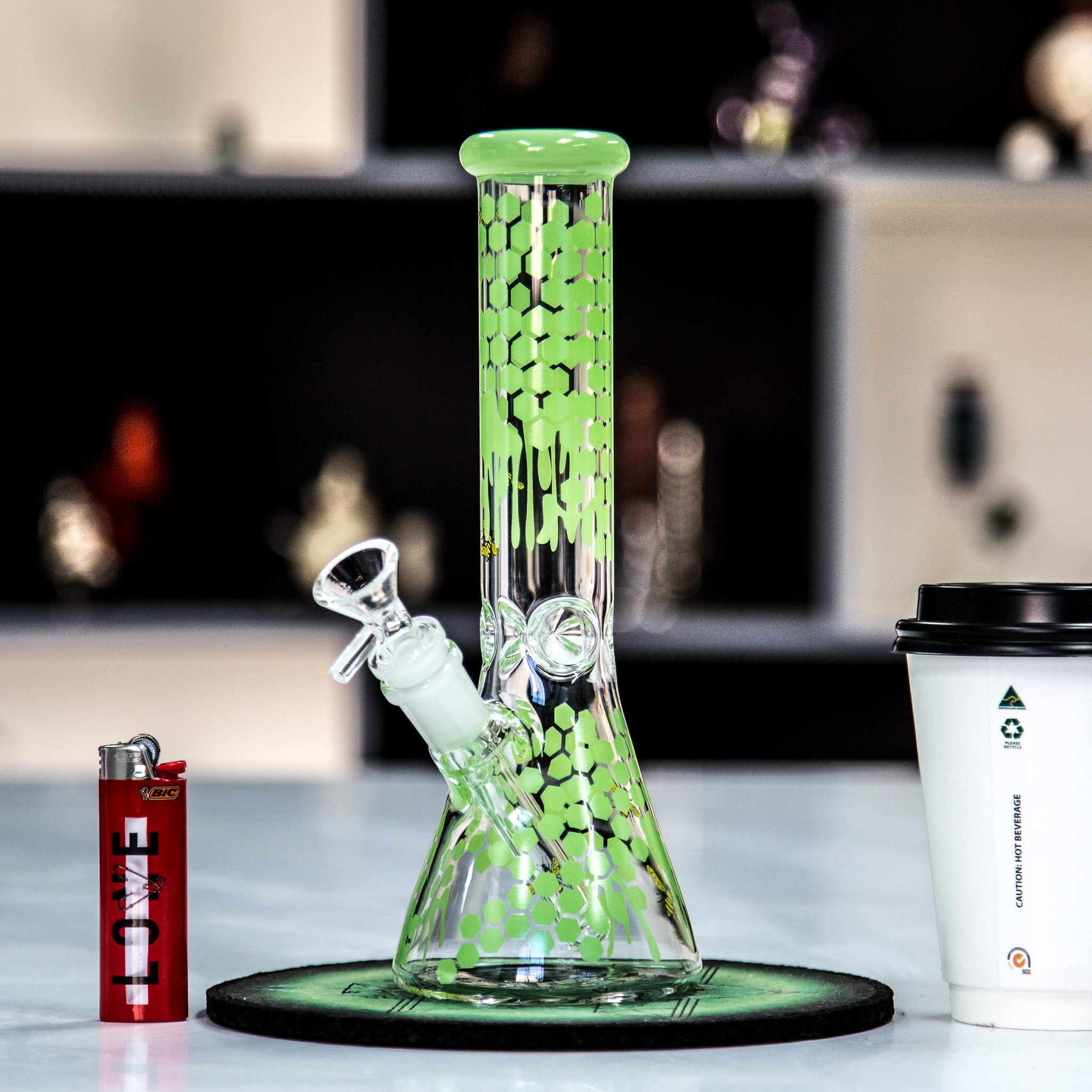 Glass honeybee bong sitting on a table at Easy Bong shop in Australia.