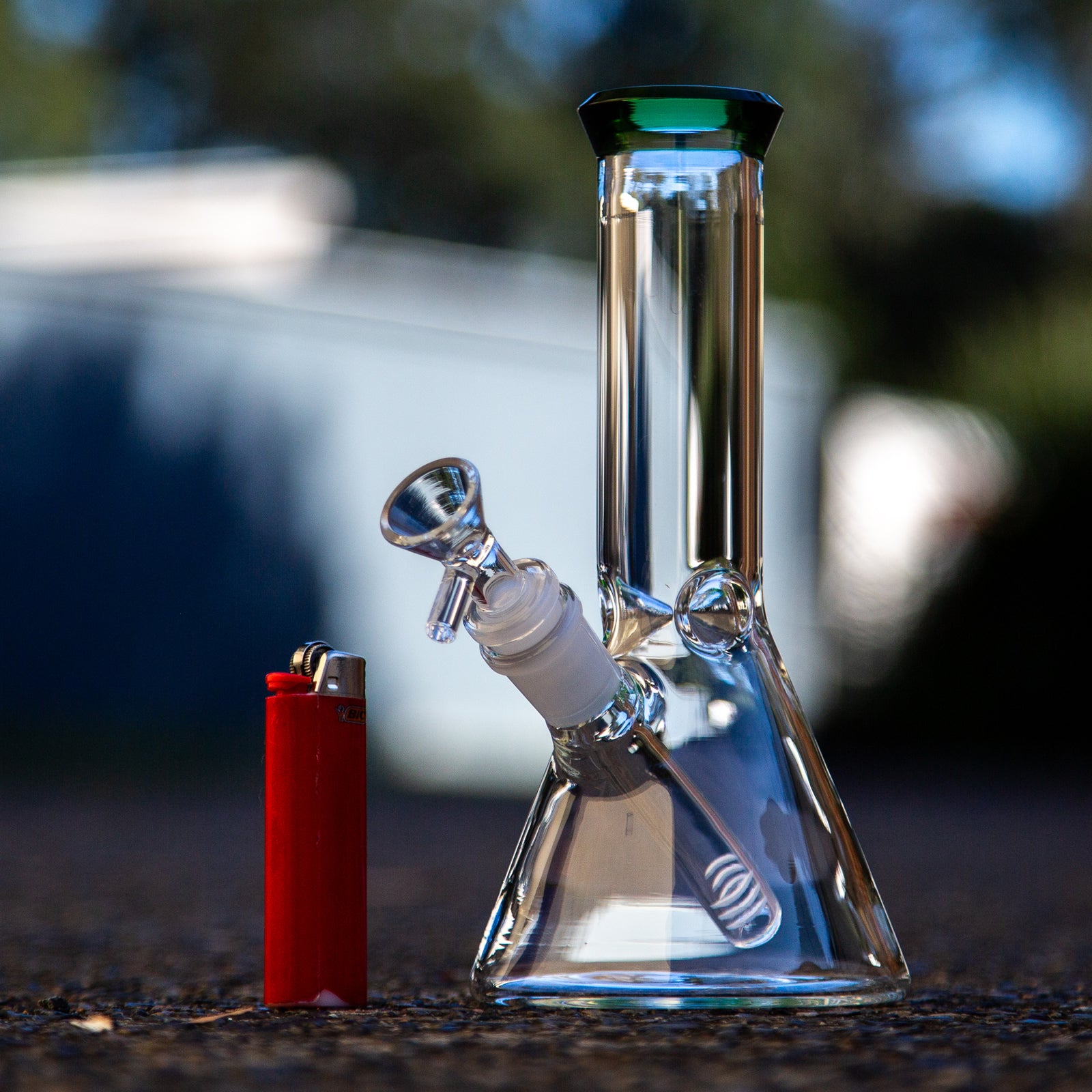 Cheap glass beaker bong outside in NSW Australia.