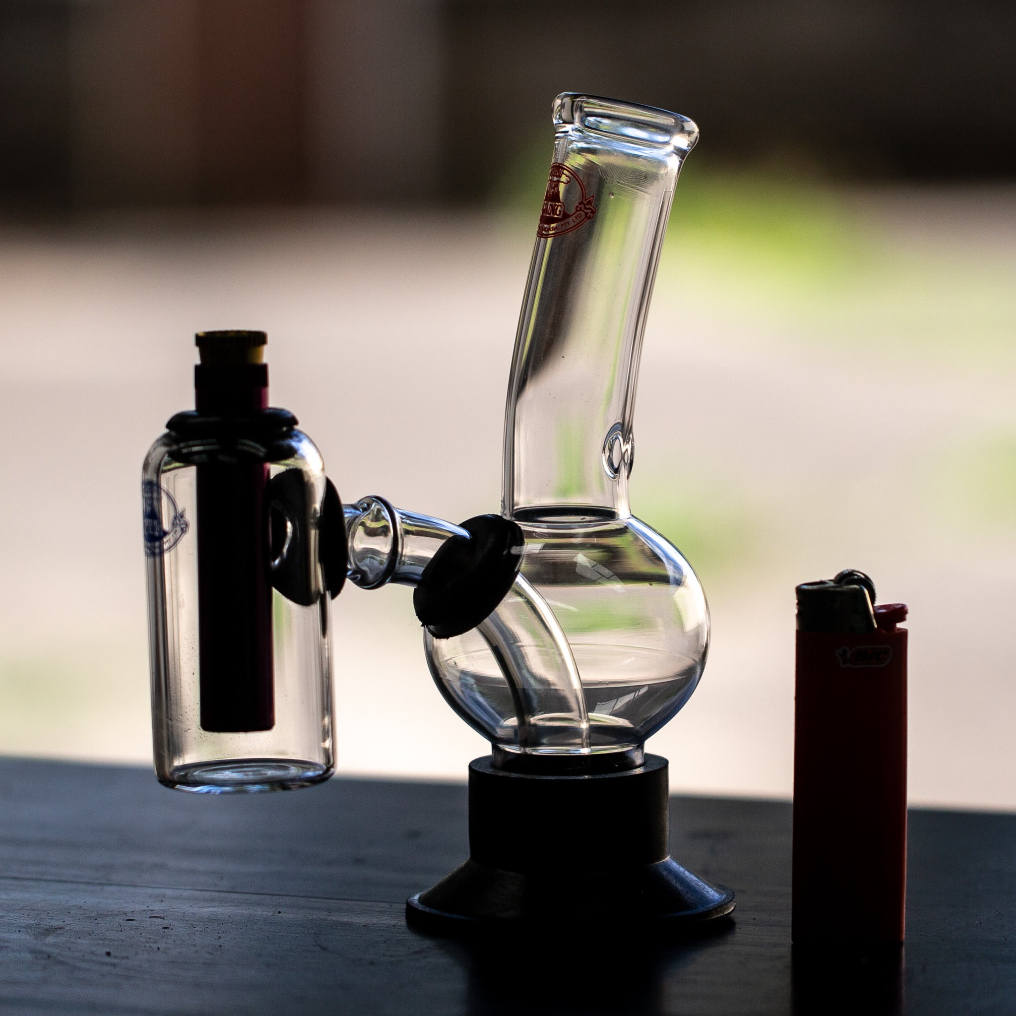 Small glass bong from Agung with double chamber for smoother bong hit.