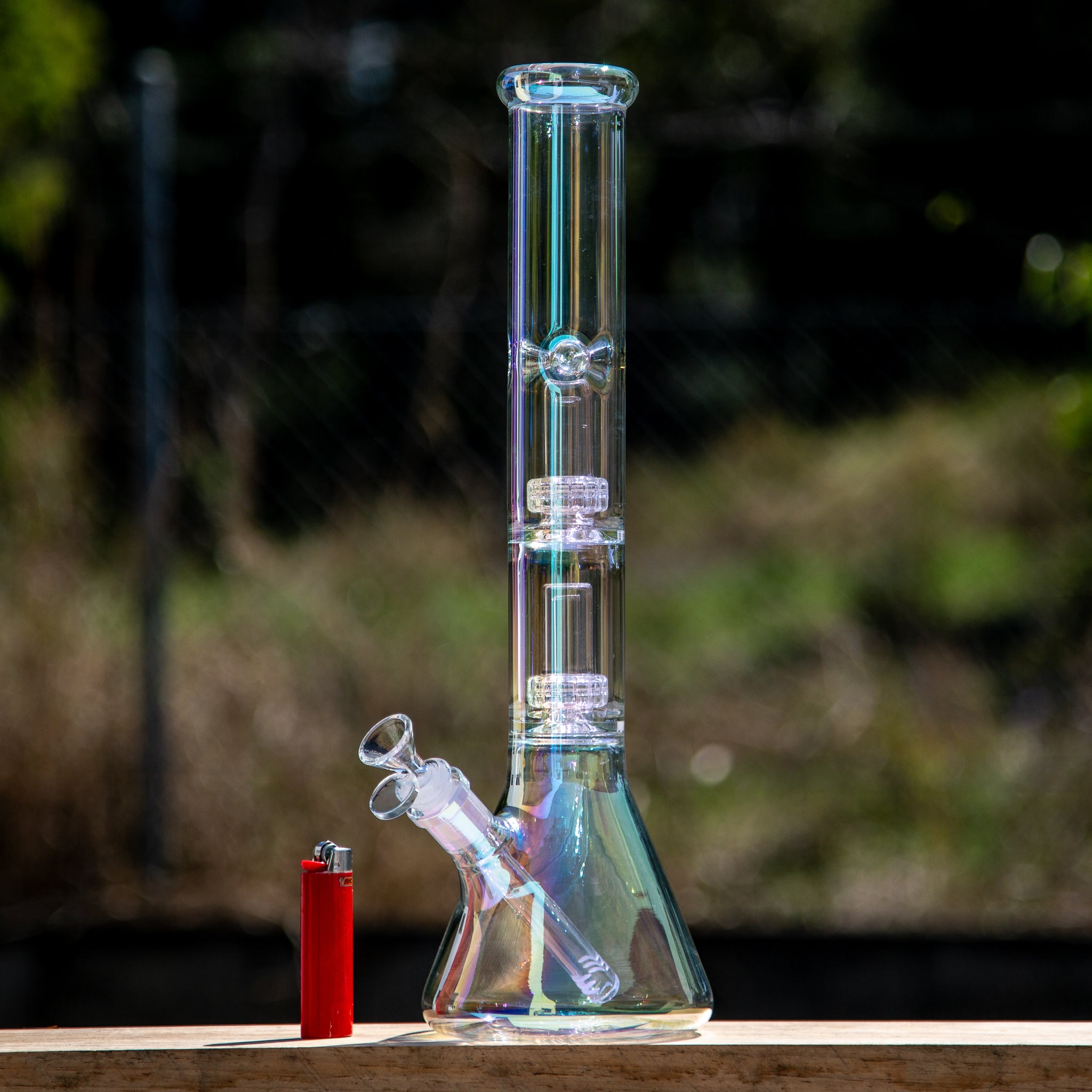 Tall glass beaker bong with twin percs for diffusion and chromatic lustre effect at Easy Bong in Australia.