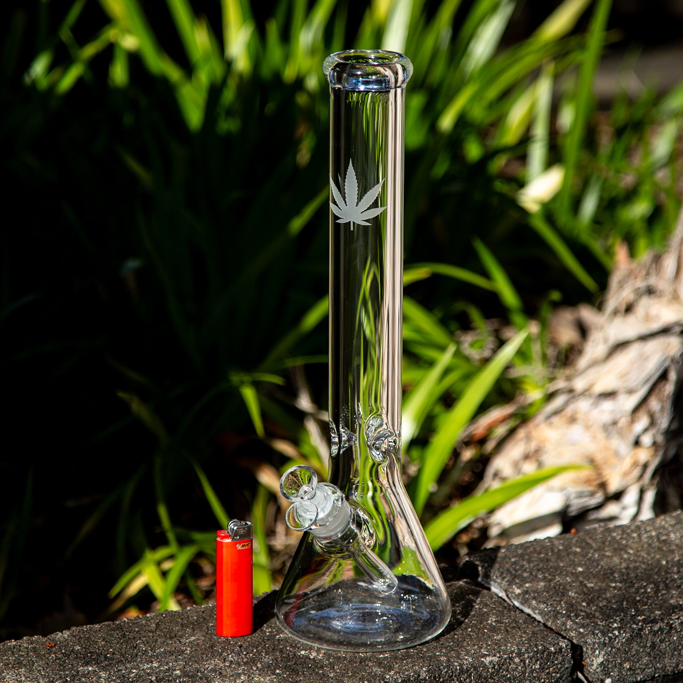 Aussie glass beaker bong with weed leaf design sandblasted into neck.